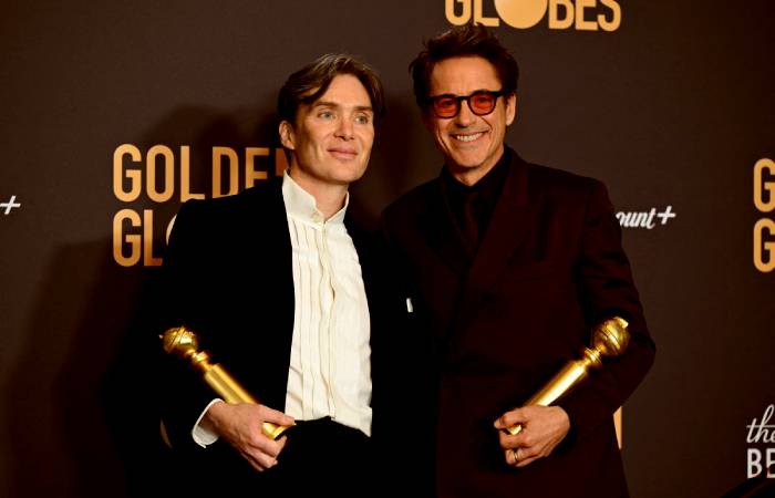Cillian Murphy and Robert Downey Jr. with their Golden Globes for Oppenheimer