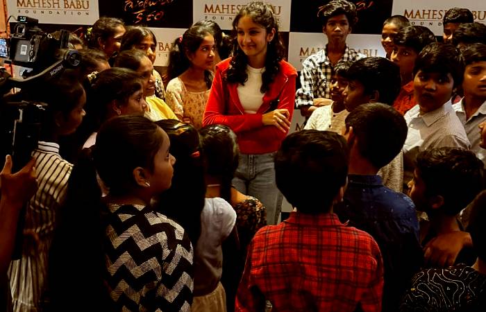 Sithara interacting with the kids at the screening