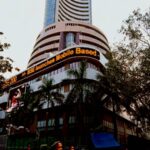 Stock Markets hit new benchmarks with rally in banking stocks